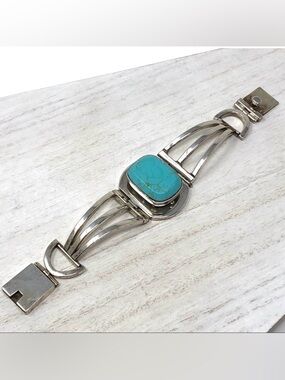 Sterling silver, turquoise* open cut bracelet, 87.8g